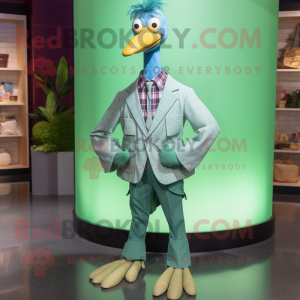 Green Swan mascot costume character dressed with a Chambray Shirt and Ties