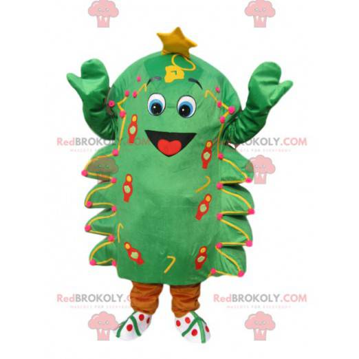 Green fir mascot with a big smile and a golden star -