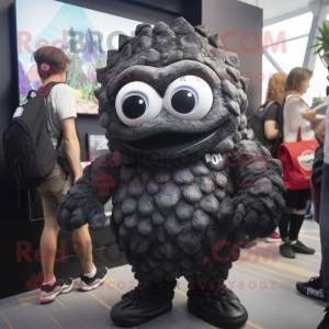 Black Oyster mascot costume character dressed with a Playsuit and Backpacks