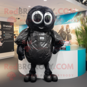 Black Oyster mascot costume character dressed with a Playsuit and Backpacks