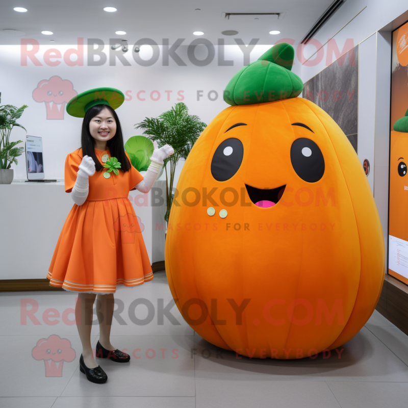 Orange Melon mascot costume character dressed with a A-Line Dress and Smartwatches