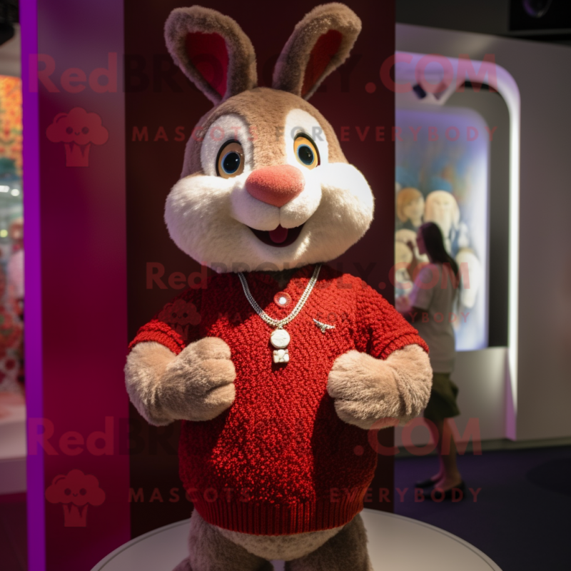 Maroon Rabbit mascot costume character dressed with a Henley Tee and Necklaces Maroon Rabbit mascot costume character dressed with a Henley Tee and Necklaces