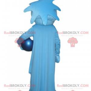 Very smiling blue character mascot with a blue balloon -