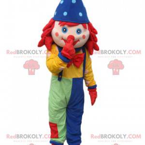 Clown mascotte met overall en een blauwe puntmuts -