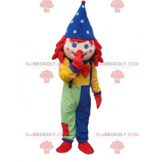 Clownmaskot med overaller och en blå spetsig hatt -