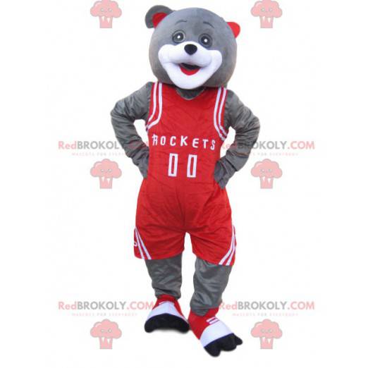 Graues Bärenmaskottchen mit roter Sportbekleidung -
