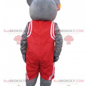 Mascotte orso grigio con abbigliamento sportivo rosso -