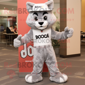 Gray Bobcat mascot costume character dressed with a Flare Jeans and Hat pins