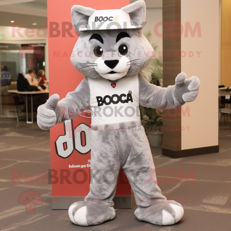 Gray Bobcat mascot costume character dressed with a Flare Jeans and Hat pins Gray Bobcat mascot costume character dressed with a Flare Jeans and Hat pins
