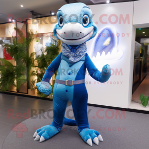 Blue Python mascot costume character dressed with a Chinos and Brooches