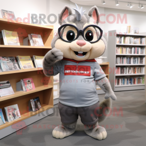 Gray Chipmunk mascot costume character dressed with a Graphic Tee and Reading glasses