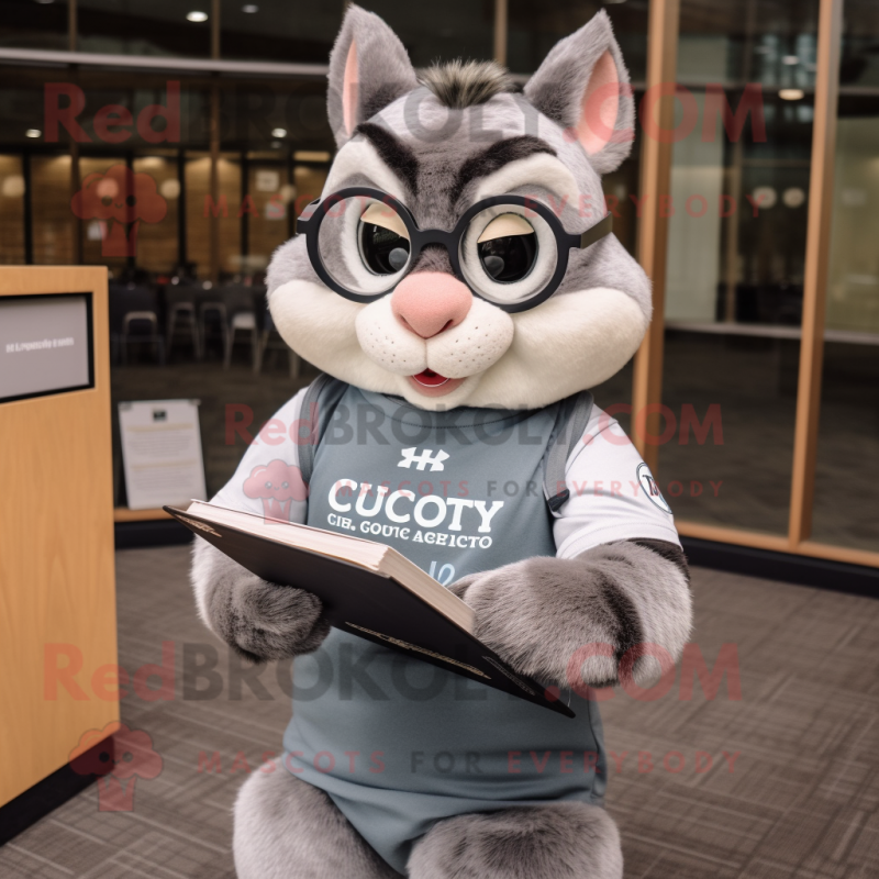 Gray Chipmunk mascot costume character dressed with a Graphic Tee and Reading glasses