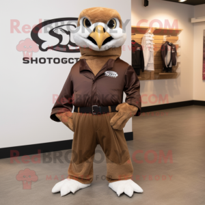 Brown Falcon mascot costume character dressed with a Leather Jacket and Shoe clips