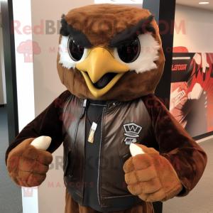 Brown Falcon mascot costume character dressed with a Leather Jacket and Shoe clips
