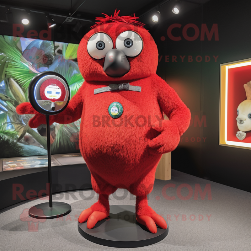 Red Kiwi mascot costume character dressed with a Button-Up Shirt and Anklets