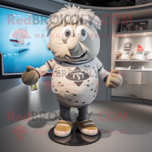 Silver Potato mascot costume character dressed with a Rugby Shirt and Rings
