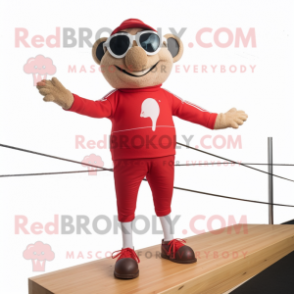 Red Tightrope Walker mascot costume character dressed with a Rugby Shirt and Sunglasses