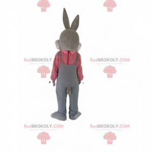 Gray rabbit mascot with overalls and a plaid shirt -