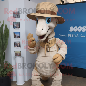 Beige Sea Horse mascot costume character dressed with a Oxford Shirt and Hat pins