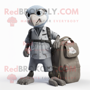 Silver Falcon mascot costume character dressed with a Dungarees and Backpacks