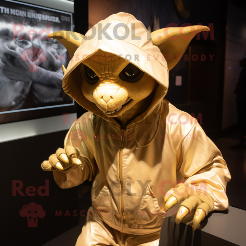 Gold Gargoyle mascot costume character dressed with a Hoodie and Caps Gold Gargoyle mascot costume character dressed with a Hoodie and Caps