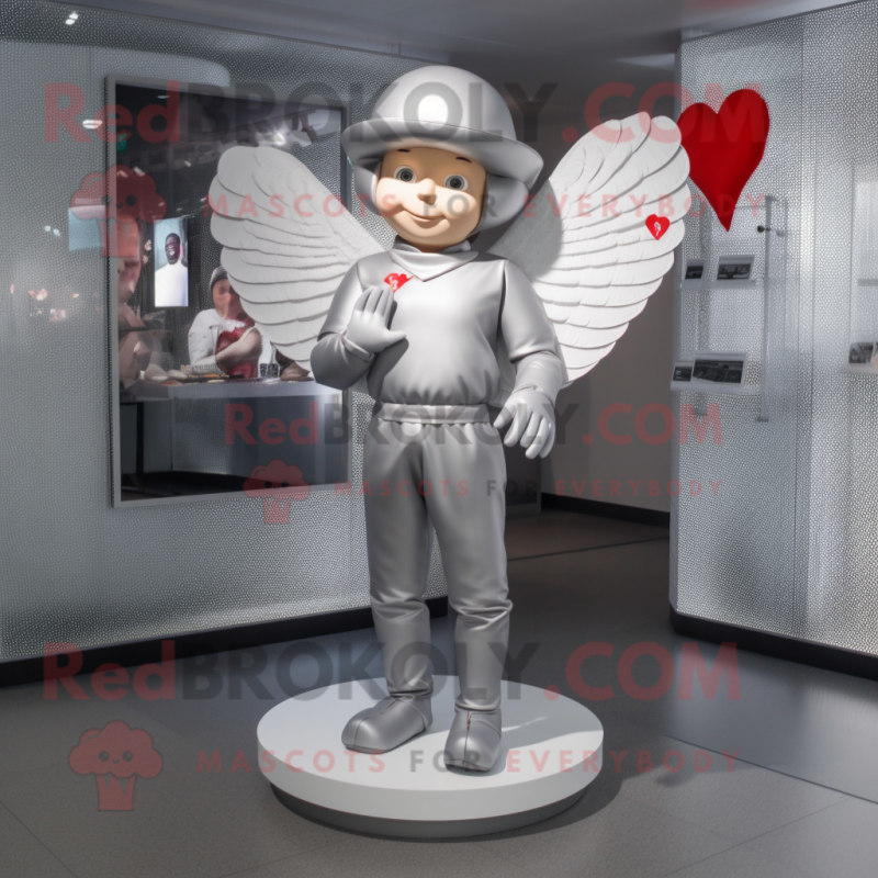 Silver Cupid mascot costume character dressed with a Long Sleeve Tee and Berets
