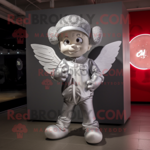 Silver Cupid mascot costume character dressed with a Long Sleeve Tee and Berets