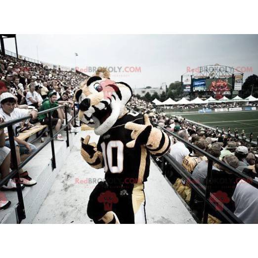 Mascote tigre bege e branco em roupas esportivas -