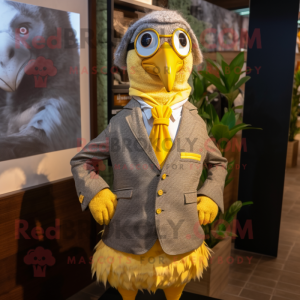 Yellow Guinea Fowl mascot costume character dressed with a Dress Shirt and Headbands
