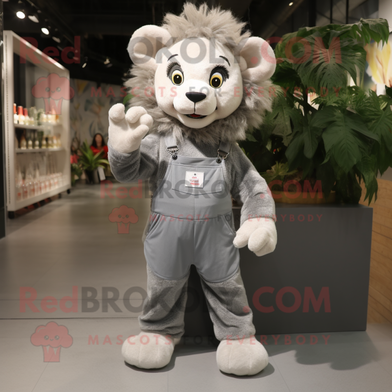 Gray Lion mascot costume character dressed with a Dungarees and Keychains