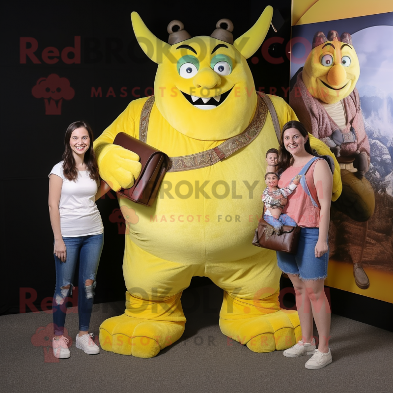Lemon Yellow Ogre mascot costume character dressed with a Mom Jeans and Wallets Lemon Yellow Ogre mascot costume character dressed with a Mom Jeans and Wallets