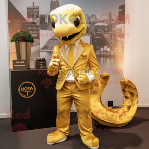 Gold Hydra mascot costume character dressed with a Trousers and Pocket squares