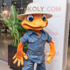 Orange Geckos mascot costume character dressed with a Denim Shirt and Hat pins