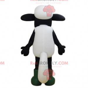 White and black sheep mascot with big eyes and boots -