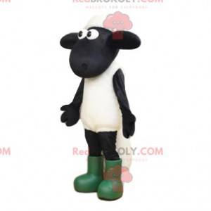 White and black sheep mascot with big eyes and boots -