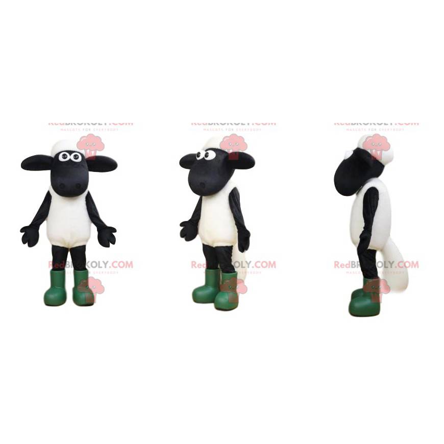Mascote ovelha branca e negra com olhos grandes e botas -