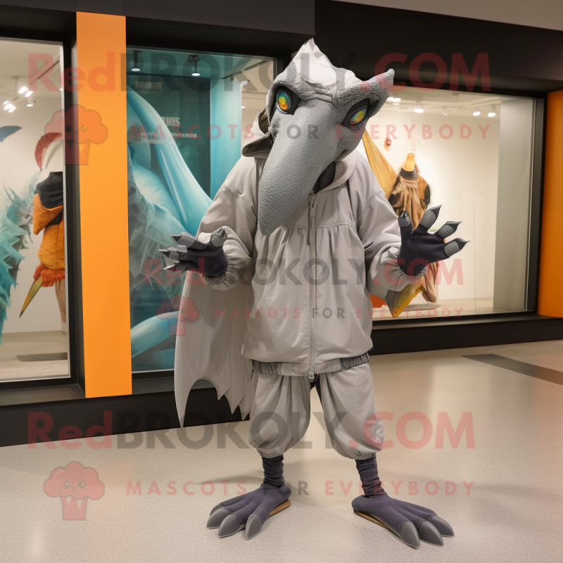 Gray Pterodactyl mascot costume character dressed with a Windbreaker and Foot pads Gray Pterodactyl mascot costume character dressed with a Windbreaker and Foot pads