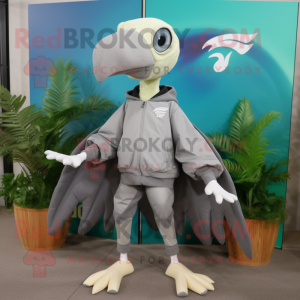 Gray Pterodactyl mascot costume character dressed with a Windbreaker and Foot pads