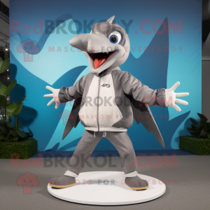 Gray Pterodactyl mascot costume character dressed with a Windbreaker and Foot pads