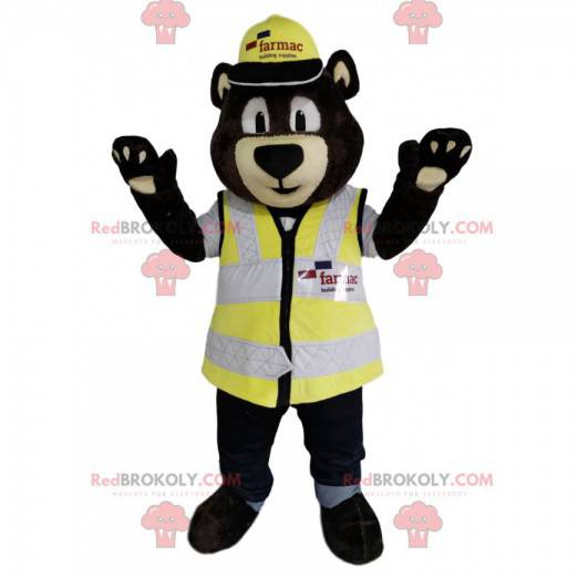 Bruine beer mascotte met een helm en een geel vest -