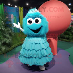 Turquoise Golf Ball mascot costume character dressed with a Ball Gown and Backpacks