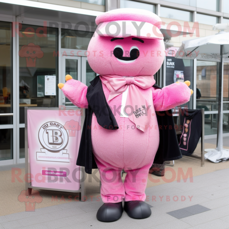 Pink Bagels mascot costume character dressed with a Suit Jacket and Scarf clips Pink Bagels mascot costume character dressed with a Suit Jacket and Scarf clips