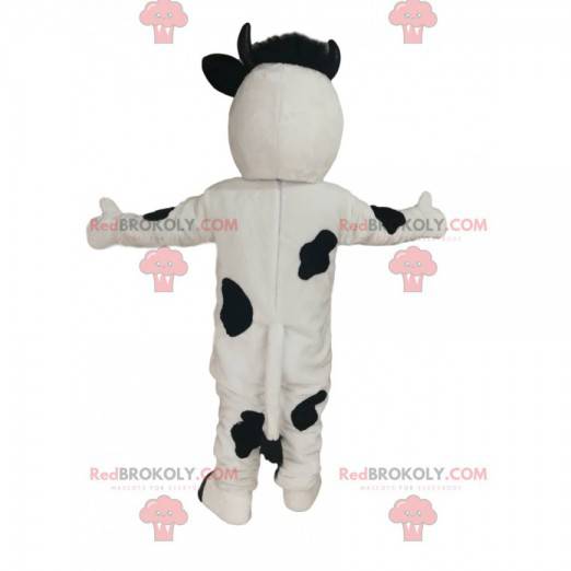 Black and white cow mascot with a big pink muzzle -