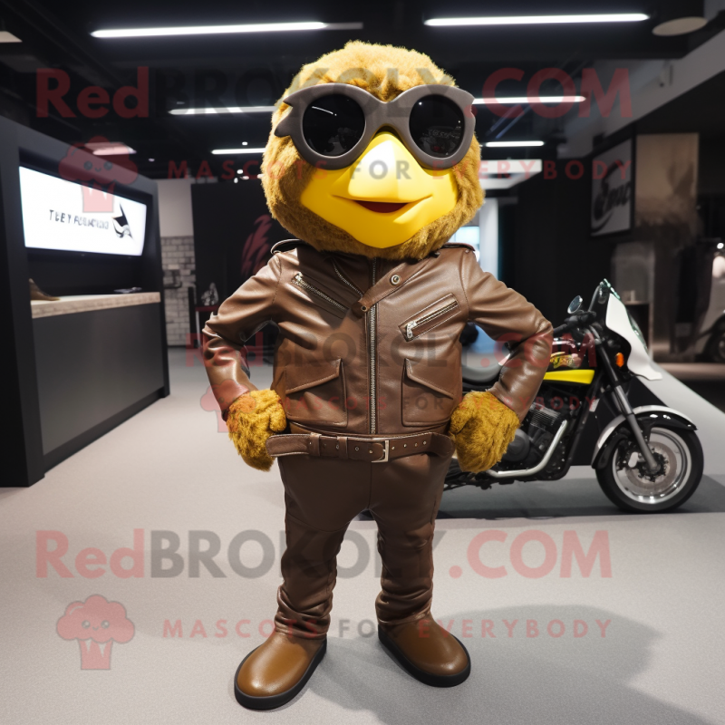 Brown Canary mascot costume character dressed with a Moto Jacket and Handbags Brown Canary mascot costume character dressed with a Moto Jacket and Handbags