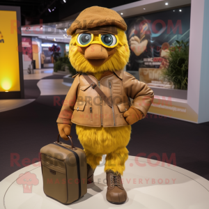 Brown Canary mascot costume character dressed with a Moto Jacket and Handbags