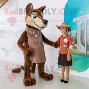 Brown Dingo mascot costume character dressed with a A-Line Dress and Shoe clips