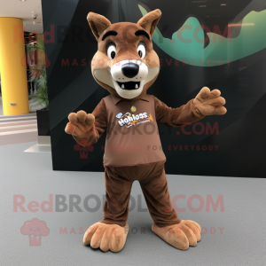 Brown Dingo mascot costume character dressed with a A-Line Dress and Shoe clips