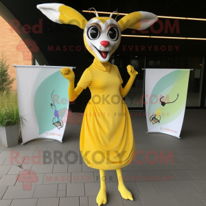 Lemon Yellow Gazelle mascot costume character dressed with a A-Line Skirt and Shawl pins
