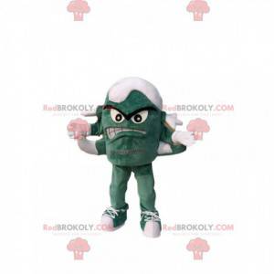 Maskot malé zelené monstrum s několika nohama.