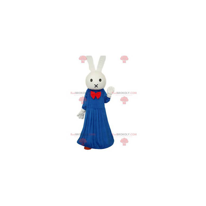 Biały królik maskotka z niebieską sukienką i czerwoną kokardką